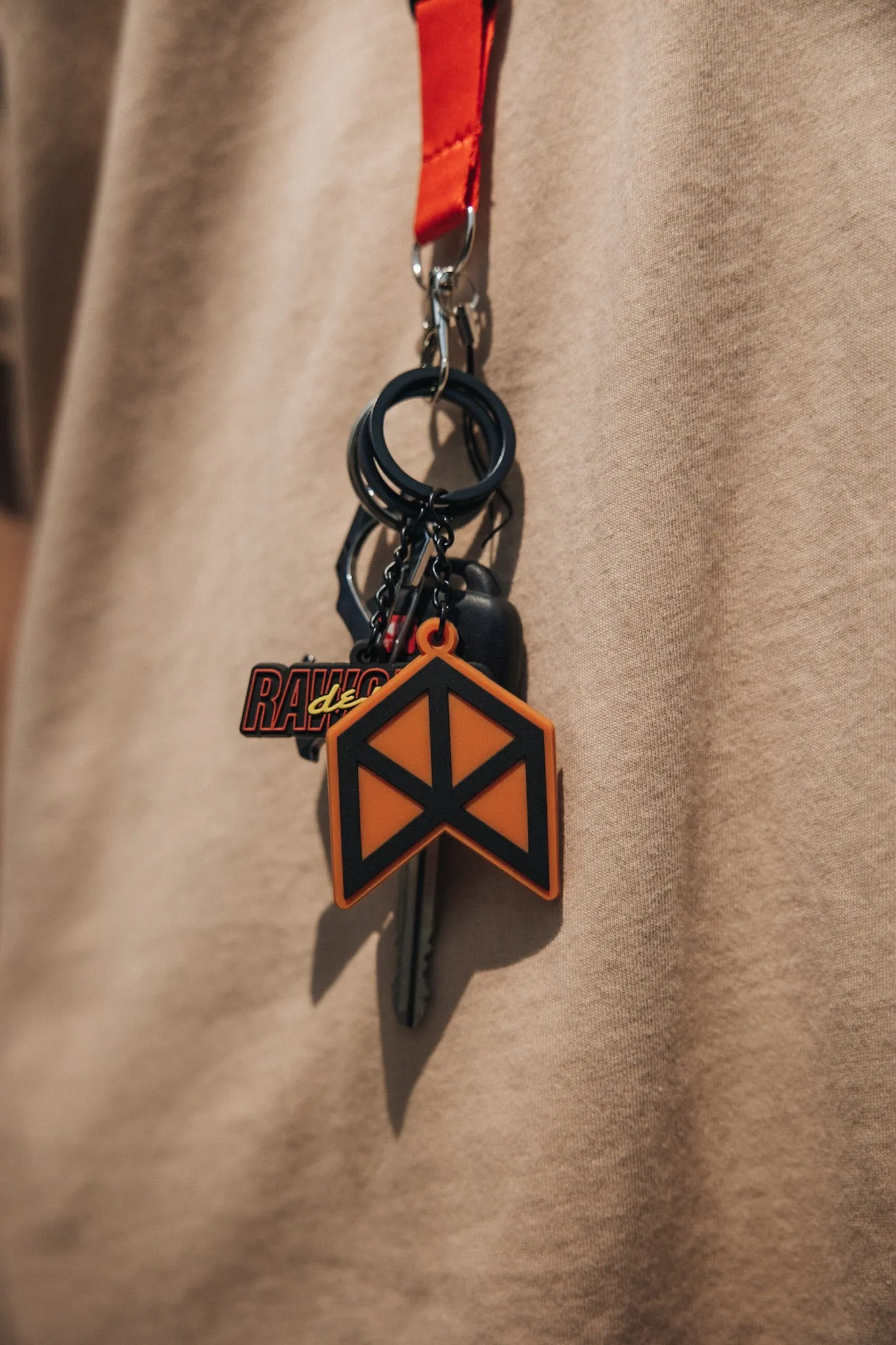 Rawgear Signature Logo Rubber Keychain - Orange/Black - RG928